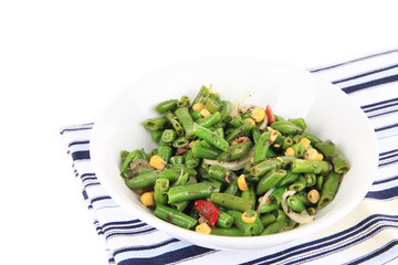 Salad with green beans, ham and  corn in bowl, close-up,