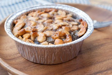 Close up image of walnut toffee cake