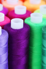 Multicolor sewing threads background
