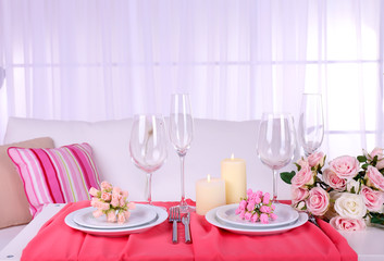 Festive table setting in interior