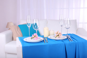 Festive table setting in interior