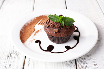 Chocolate muffin with chocolate sauce