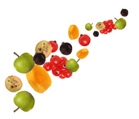 Fresh fruit skewers isolated on white