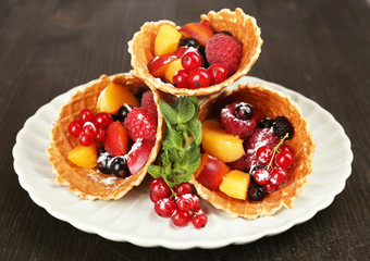 Fresh fruit dessert for healthy snack on wooden table close up