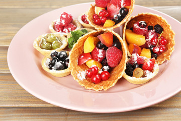 Fresh fruit dessert for healthy snack on wooden table close up