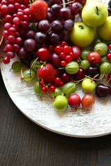 Fototapeta na wymiar Fresh berries on table, close up