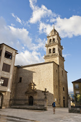Fototapeta na wymiar Pilgrim arriving Encina Church in Ponferrada, Bierzo, Spain.