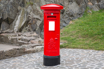 Typical red british postbox