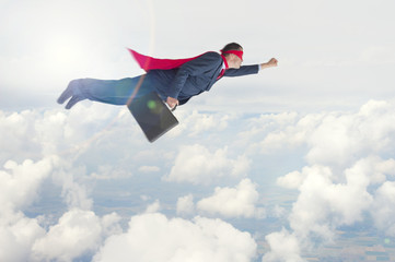 superhero businessman in flight