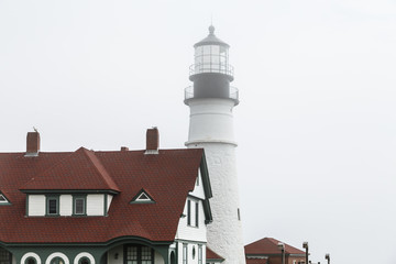 Red Roof and Foggy Lighthouse