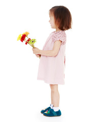 young girl with a bouquet of flowers