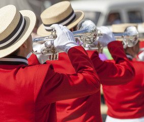 Brass Band in red uniform performing