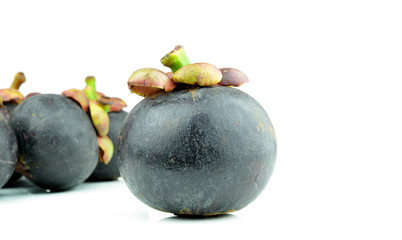 Mangosteen - Tropical Fruits Mangosteen on white background