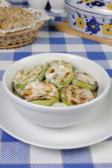 Zucchini in milk sauce