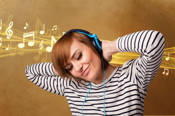 Young woman with headphones listening to music