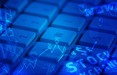 Keyboard with glowing business icons