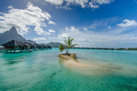 Luxury overwater bungalows with view of Pacific Ocean