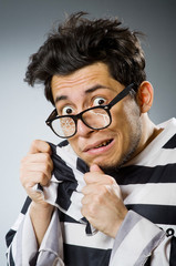 Funny prison inmate in concept