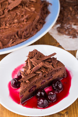 Chocolate mousse cake with dark cherries