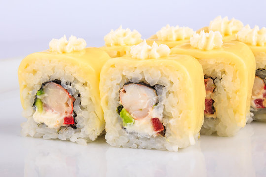 Sushi roll with crabs and avocado