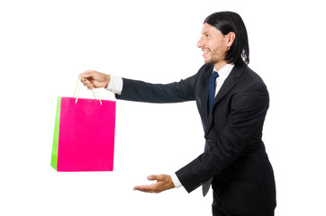 Man with shopping bags isolated on white