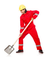 Fototapeta premium Man in red coveralls with spade
