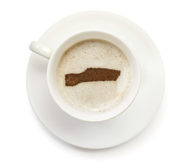 Cup of coffee with foam and powder in the shape of Gambia.(serie