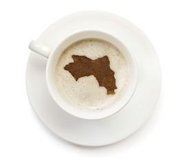 Cup of coffee with foam and powder in the shape of Guinea.(serie
