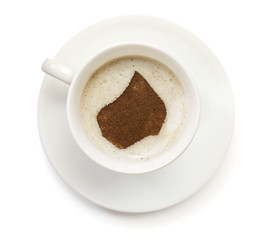 Cup of coffee with foam and powder in the shape of Lesotho.(seri