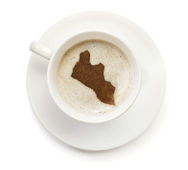 Cup of coffee with foam and powder in the shape of Liberia.(seri