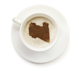 Cup of coffee with foam and powder in the shape of Libya.(series