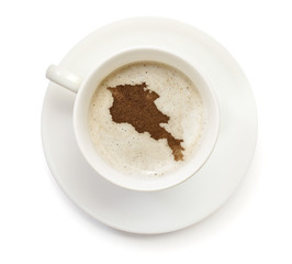 Cup of coffee with foam and powder in the shape of Armenia.(seri