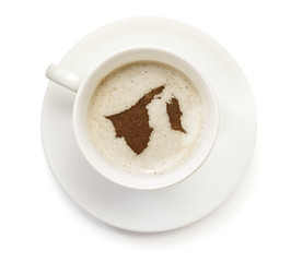 Cup of coffee with foam and powder in the shape of Brunei.(serie