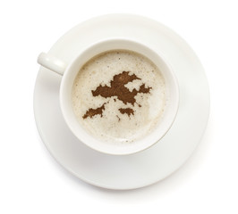 Cup of coffee with foam and powder in the shape of Hong Kong.(se