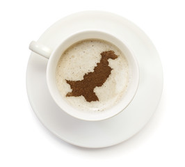 Cup of coffee with foam and powder in the shape of Pakistan.(ser