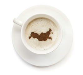 Cup of coffee with foam and powder in the shape of Russia.(serie