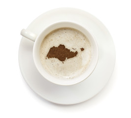 Cup of coffee with foam and powder in the shape of Singapore.(se