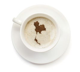 Cup of coffee with foam and powder in the shape of Thailand.(ser