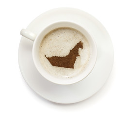 Cup of coffee with foam and powder in the shape of United Arab E