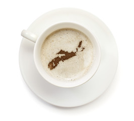Cup of coffee with foam and powder in the shape of Nova Scotia.(