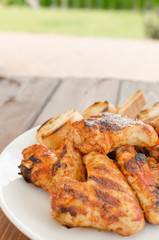 Chicken wings on grill