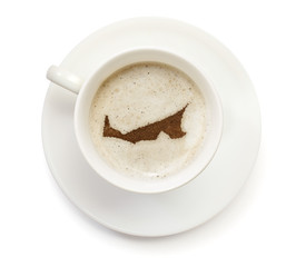 Cup of coffee with foam and powder in the shape of Prince Edward