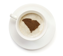 Cup of coffee with foam and powder in the shape of South Carolin