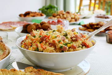Bowl of rice salad on a buffet table