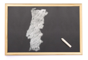 Blackboard with a chalk and the shape of Portugal drawn onto. (s