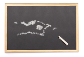 Blackboard with a chalk and the shape of Palmyra Atoll drawn ont
