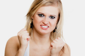 Naklejka premium Blonde girl winner celebrating success hand gesture