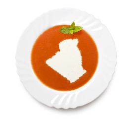 Plate tomato soup with cream in the shape of Algeria.(series)