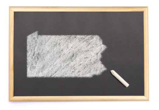 Blackboard with a chalk and the shape of Pennsylvania drawn onto