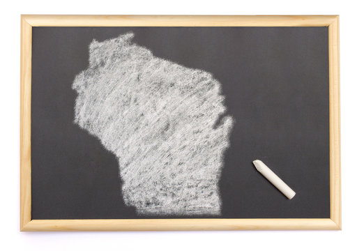 Blackboard with a chalk and the shape of Wisconsin drawn onto. (